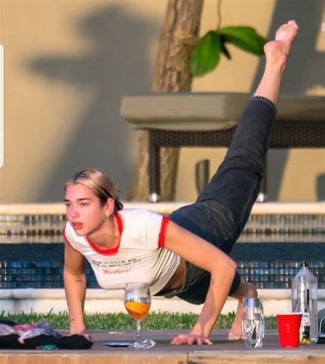 Best 12 Dua Lipa Shares Kisses With Anwar Hadid After Stripping To Her Bikini Artofit