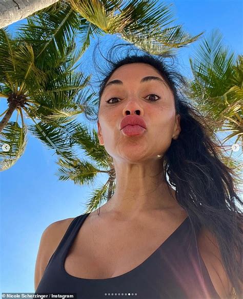 Nicole Scherzinger Flaunts Her Jaw Dropping Figure In A Leopard Print Bikini As She Soaks Up The