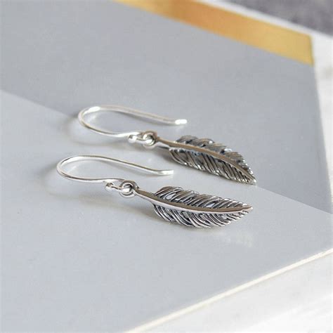 Sterling Silver Tiny Feather Earrings By Mia Belle Notonthehighstreet