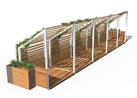 An Elevated Wooden Planter With Plants Growing On The Top And Bottom