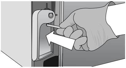 Inserting Emergency Door Locking Pin Into Hole Of Statclave G4 Handle