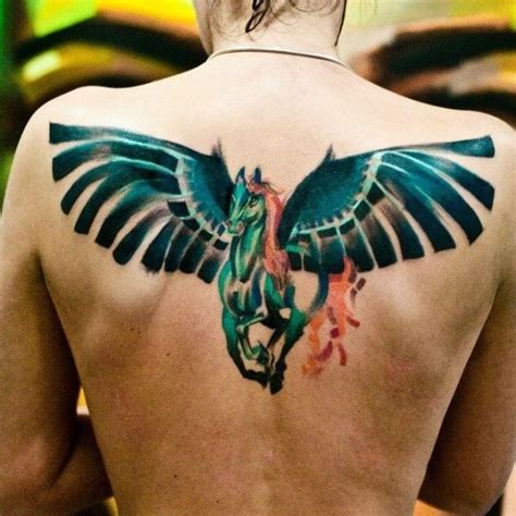 Torquoise Pegasus With Unusual Wings Tattoo On Upper Arm Pegasus