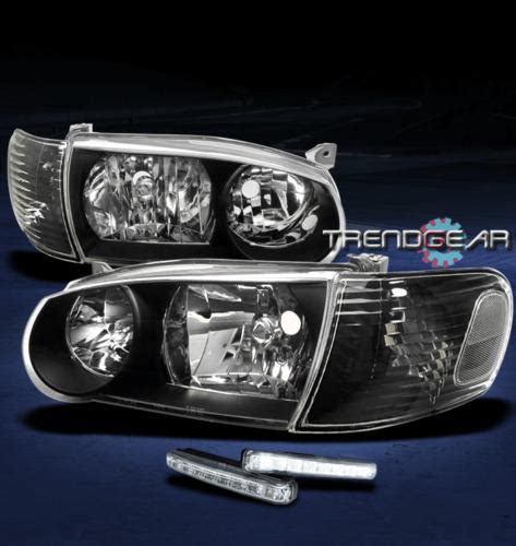 Find 01 02 TOYOTA COROLLA CRYSTAL JDM BLACK HEAD LIGHTS CORNER WHITE