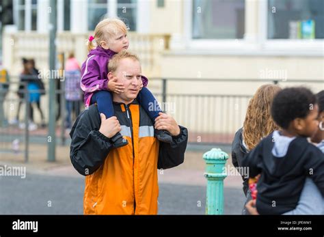 Father Carrying His Daughter On His Shoulders Stock Photo Alamy