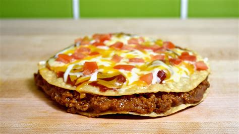 Lawsuit Asks Taco Bell To Beef Up Its Mexican Pizza And Crunchwrap