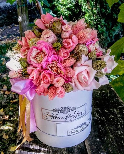 Rustic White Bucket With Pink Flowers