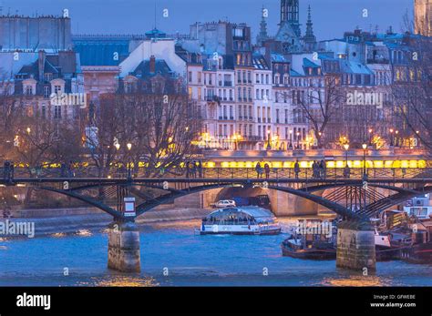 Paris Bridge Seine Night View On A Winter Evening Of Two Paris Bridges