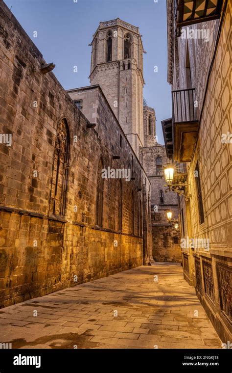 The historic Barrio Gotico in Barcelona at twilight with the Cathedral ...