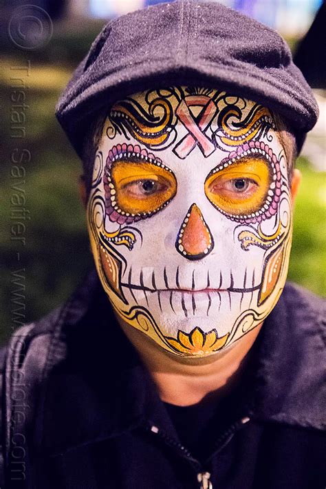 man with sugar skull makeup, dia de los muertos