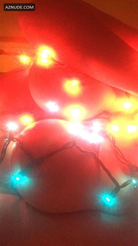 Maitland Ward Covers Her Big Tits With Hands And Christmas Lights AZNude