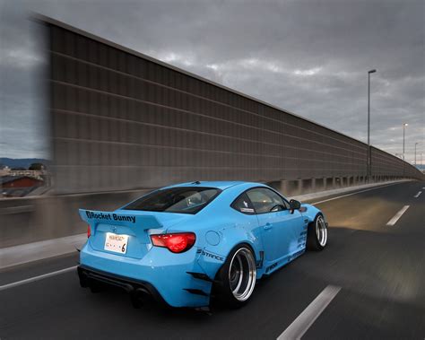 Toyota Gt86 Arrière De Voiture Bleue Vue Autoroute Fonds Décran