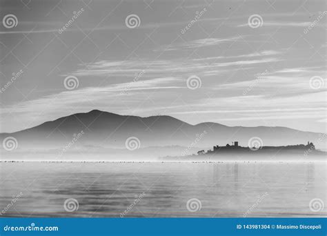 Beautiful View of Trasimeno Lake at Sunset with Birds on Water and ...