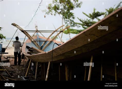 Traditional Indonesian Wooden Boat Building Stock Photo Alamy