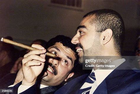 309 Saddam Hussein Sons Stock Photos High Res Pictures And Images