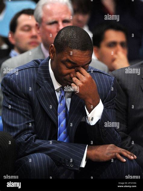 New York Knicks Head Coach Isiah Thomas Puts His Head Down As His Team