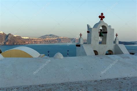 Church With Blue Roof In Town Of Oia And Panorama To Santorini Island