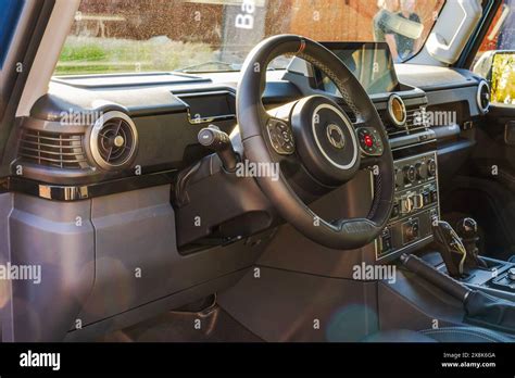 Close-up interior view of a modern INEOS Grenadier SUV with steering ...