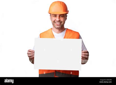 Construction Worker Showing Empty Poster Board Standing On White