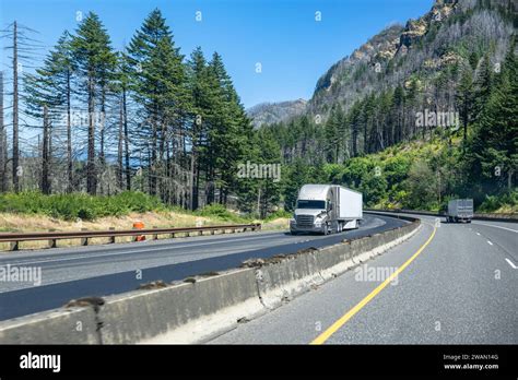 Industrial Carriers Two Big Rig Semi Trucks With Refrigerator Semi