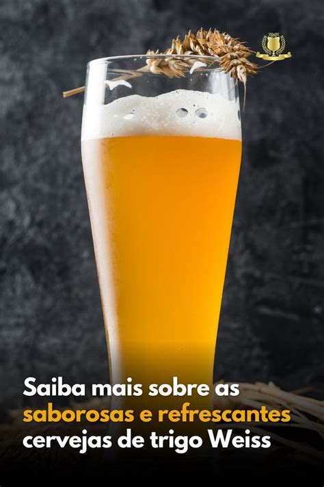 A Tall Glass Filled With Beer Sitting On Top Of A Table