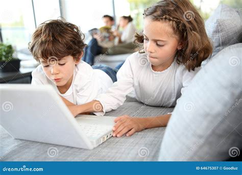 Children Playing On Laptop Stock Image Image Of House 64675307