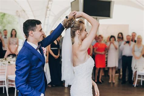 Premium Photo Stylish Happy Bride And Groom Gently Dancing At Wedding