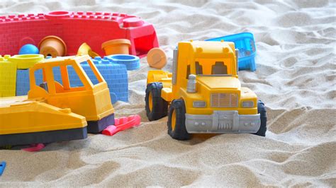 sand and colorful toys in a playground indoors. 38744012 Stock Video at ...