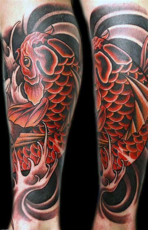 A Man S Leg With A Koi Fish Tattoo On It