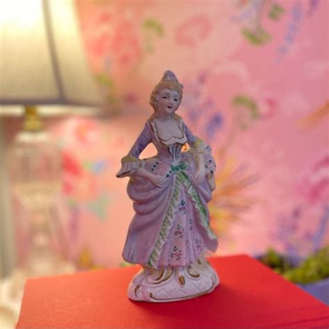 Vintage Japanese Ceramic Figurine Of Victorian Woman Carrying Flowers