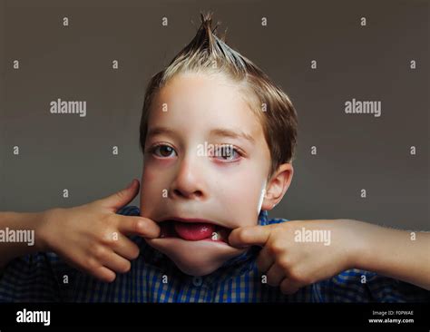 Playful Little Boy Making Funny Faces Stock Photo Alamy