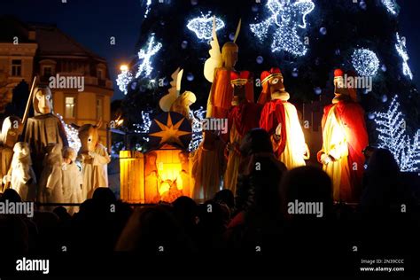 Lithuanians Dressed As The Three Kings Are Seen At The Christmas Tree