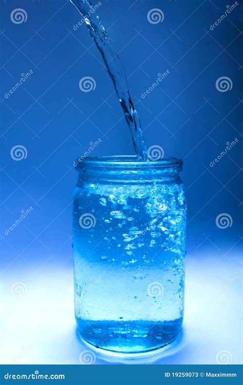 Water Flows Into A Glass Jar Stock Image Image Of Blue Glass 19259073