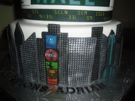 Made Fresh Daily Wall Street Bull Graduation Cake And Cupcakes