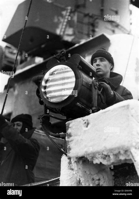 Royal Navy World War Two A Rn Signaller Uses An Aldis Lamp To Send