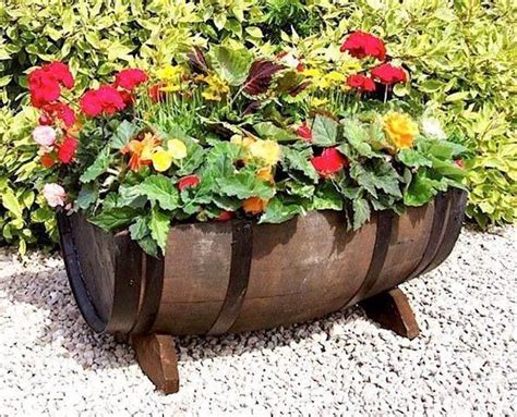 19 Creative Uses For Old Wine Barrels Outdoors Wine Barrel Planter