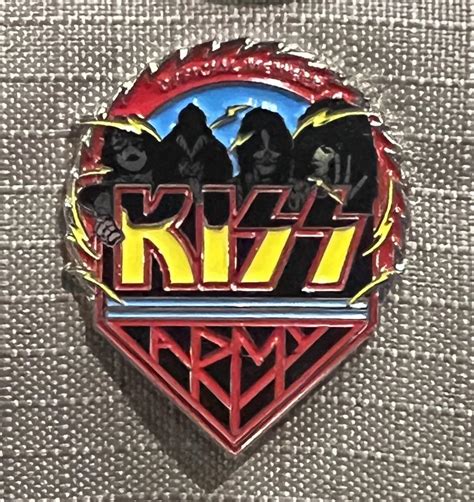 Anyone else get their KISS Army merch recently? Got this pin and a ...