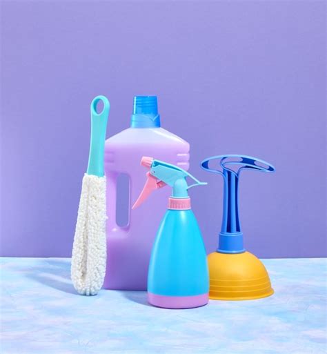 Premium Photo | Cleaning supplies Plunger water spraying bottle and ...