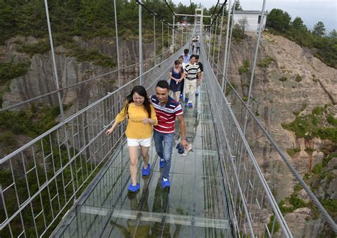 China S New Glass Bridges Test Courage Of Tourists Who Flock There Despite News Of Cracks Asia