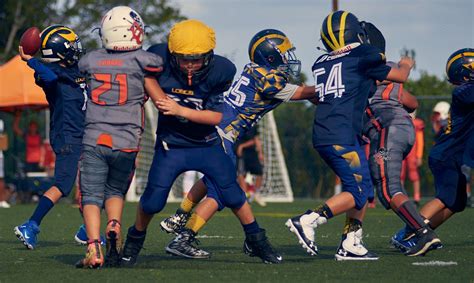 Kids Team Playing American Football · Free Stock Photo