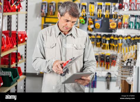 man scanning product  digital tablet stock photo alamy