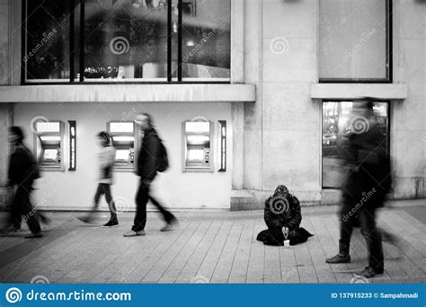 A Homeless Person Begging on the Champs Elysees Editorial Stock Photo ...