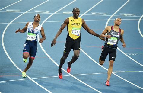 Usain Bolt Smiled For The Camera Mid-Race And It Became A Meme