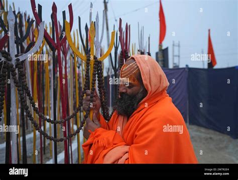 Mauni Baba A Hindu Holy Man Prepares An Area For The Month Long Magh