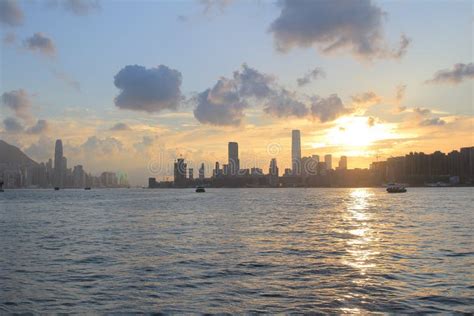 Victoria Harbor Of Hong Kong At Sunset Stock Photo Image Of Building