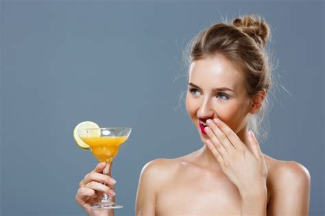 Free Photo Beautiful Blonde Woman Smiling Holding Cocktail