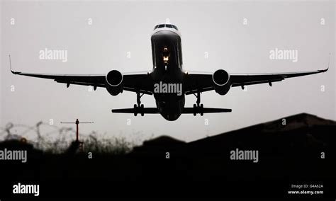 A Plane Takes Off From Glasgow Airport In Scotland Following Disruption