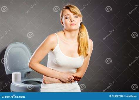 Woman Suffer From Belly Pain Holds Pills In Toilet Stock Photo Image