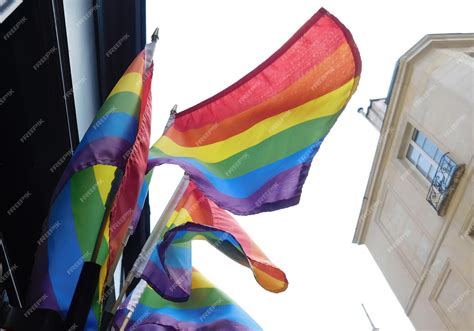 Premium Photo Pride Rainbow Lgbt Gay Flag Being Waved On Sky Background