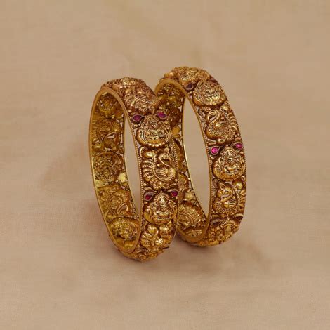 Buy Kt Gold Antique Nakshi Bangles With Lakshmi Devi And Peacock