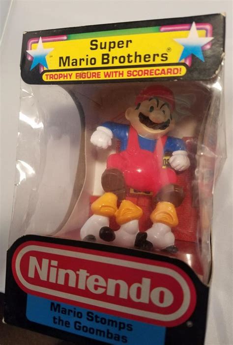 1988 Nintendo Super Mario Bros Trophy Figure Mario Stomping On Goombas